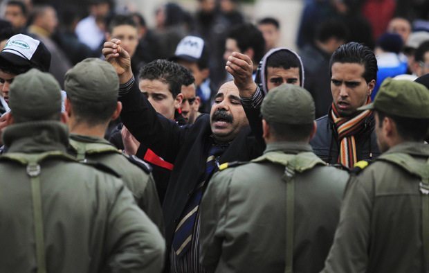  A protester from Tunisia's marginalised rural heartlands shouts during a demonstration outside the prime minister's office in Tunis January 27, 2011. Image Source: http://goo.gl/v8ToXr