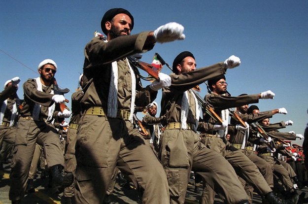 Armed Iranian mullahs (Shiite clerics) march duri-SRC:http://headlinedigest.com/2013/09/iran-threatens-brutal-attacks-on-americans-and-the-obama-family/